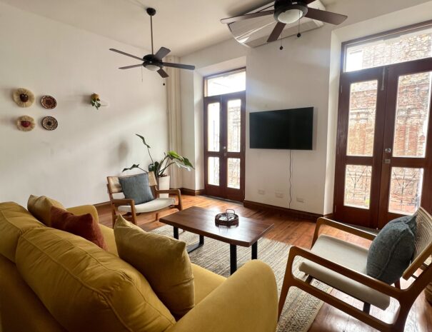 Curated living room with natural light in luxury Casco Viejo penthouse - by Bannaba Stays